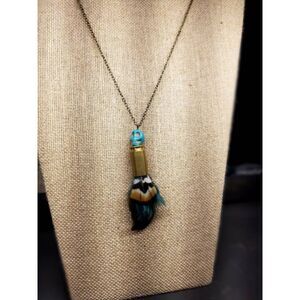 Long Skull feathers and bullet shell necklace